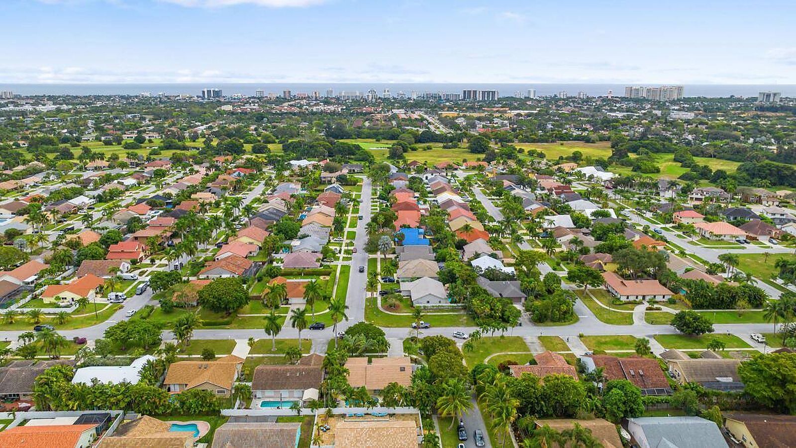 Aerial view over the single-family neighborhoods of West Boca Raton, Florida, looking east toward the coast